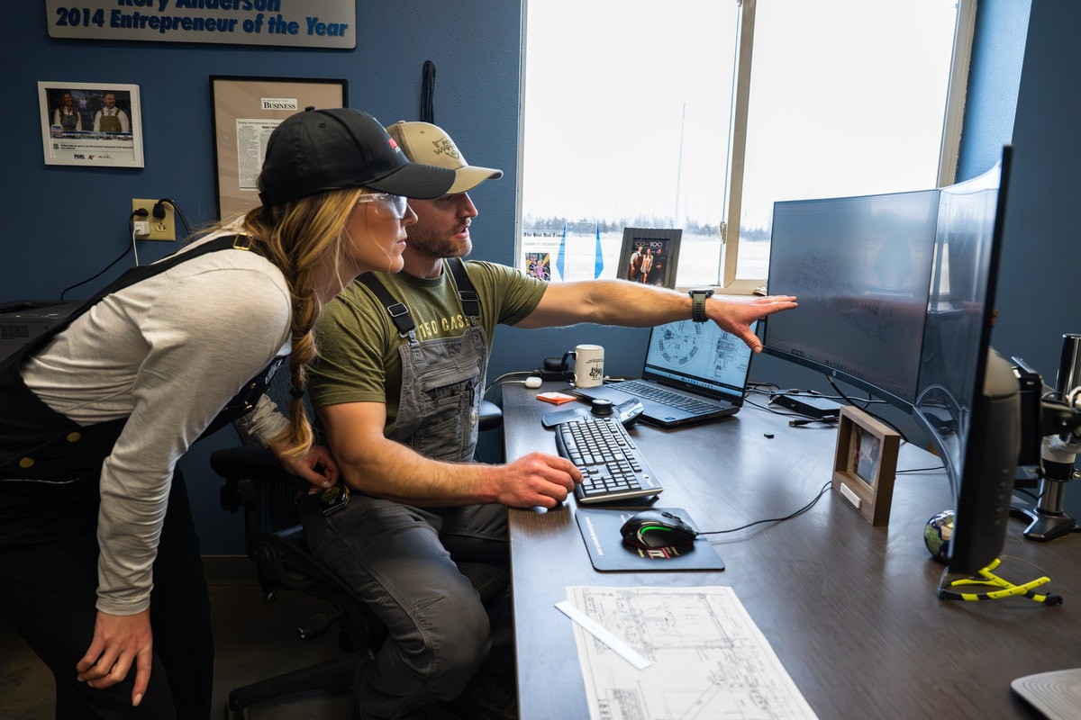 Engineer reviewing CAD design for casting optimization